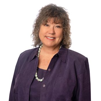 Portrait of Jeanne Wolfe, REALTOR®.